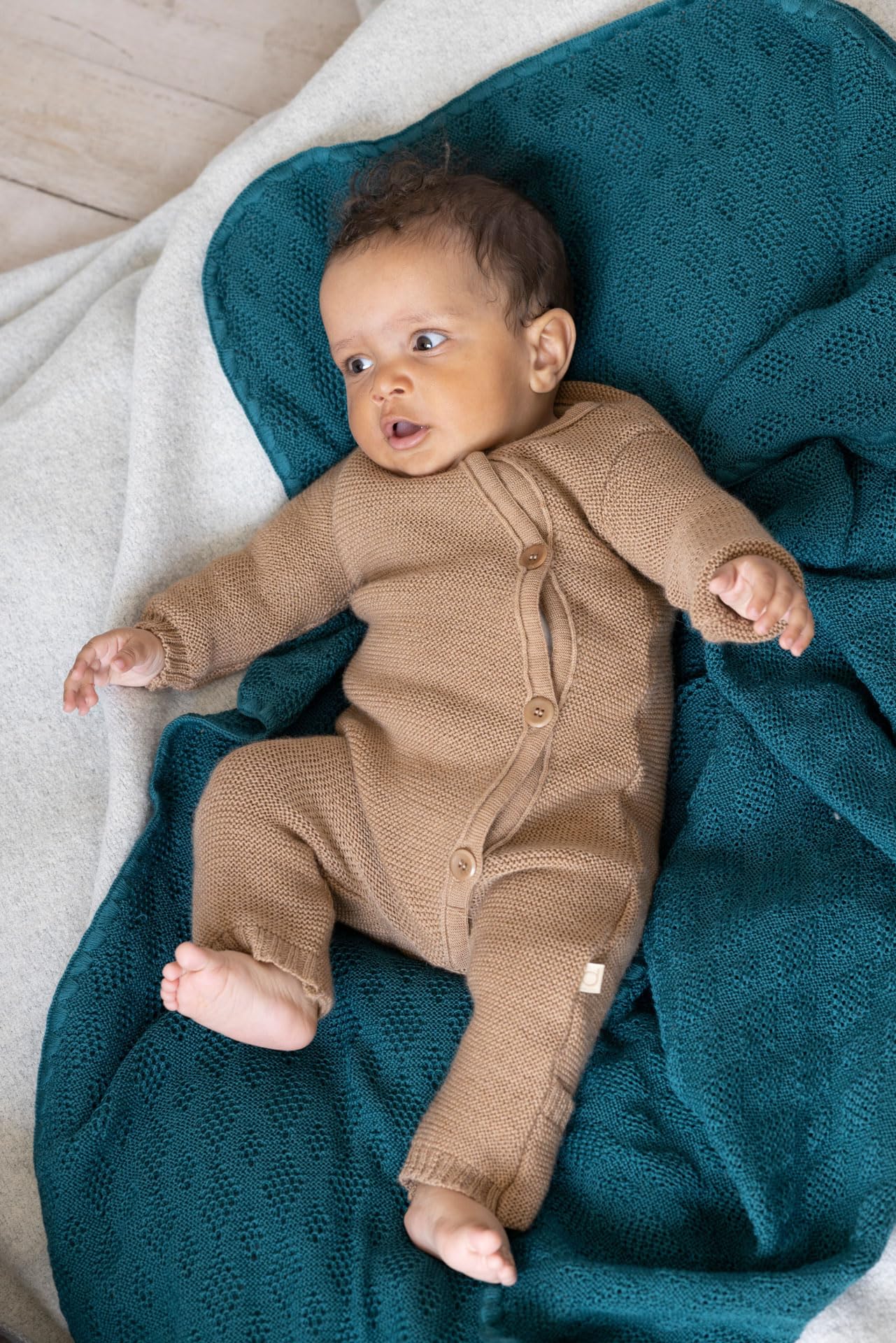 disana-woll-babydecke-100-bio-merinowolle-ajourmuster-natur image 3